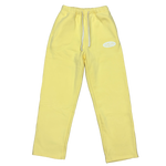 Yellow sweatpants with a white drawstring and a small white oval logo on the left thigh, shown against a plain white background.